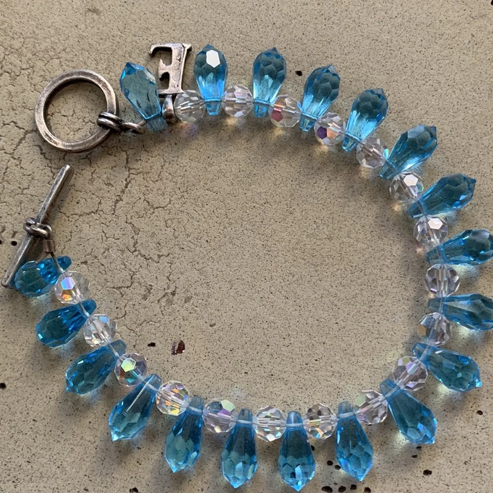 Aquamarine and crystal hand made sterling silver bracelet beautifully made.